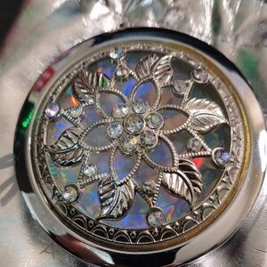 Avon Round Silver Floral Compact Mirror with Iridescent Backing